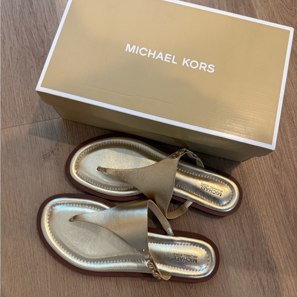 Never worn Michael Kors Gold Sandals